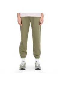 Spodnie New Balance WP33508CGN - zielone. Kolor: zielony. Materiał: bawełna, dresówka, poliester, prążkowany #1