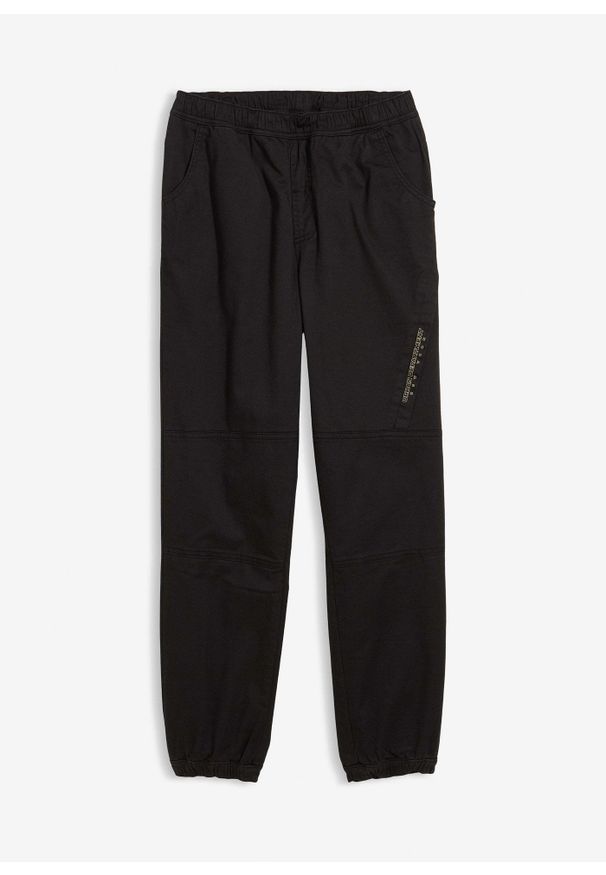 bonprix - Spodnie typu loose fit z podszewką z dżerseju. Kolor: czarny. Materiał: jersey