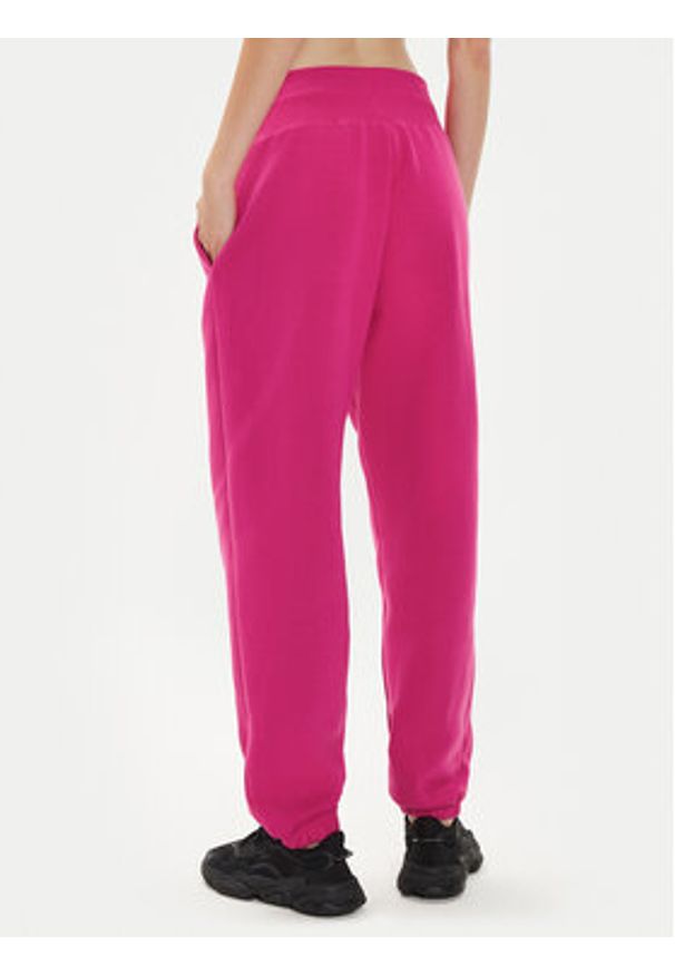 Nike Spodnie dresowe DQ5887 Różowy Oversize. Kolor: różowy. Materiał: bawełna