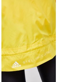 Adidas by Stella McCartney - adidas by Stella McCartney Kurtka damska kolor żółty przejściowa oversize. Typ kołnierza: kaptur. Kolor: żółty. Materiał: materiał. Długość rękawa: raglanowy rękaw #9