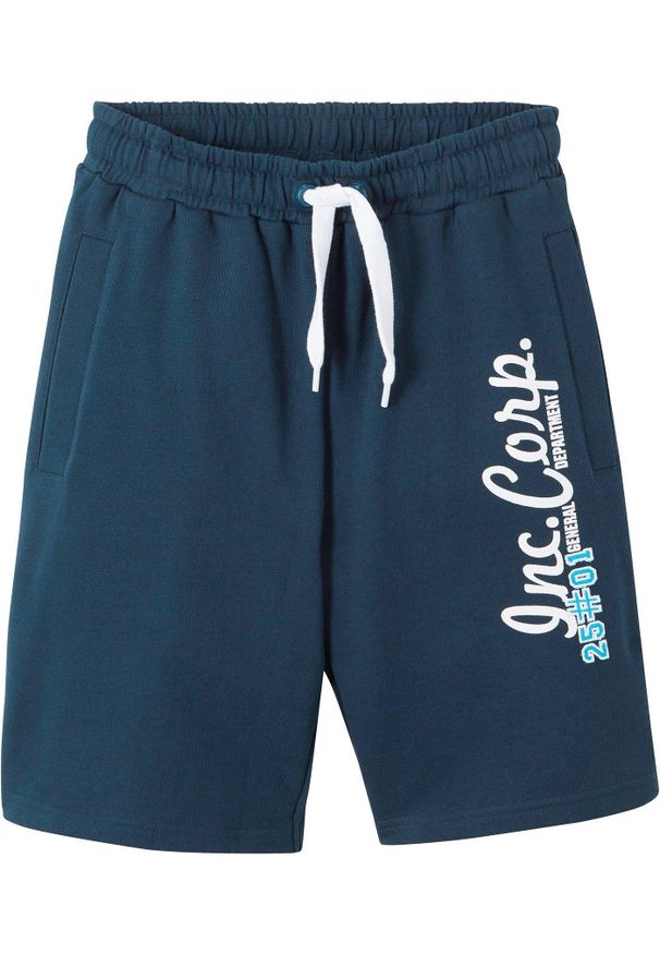 bonprix - Bermudy dresowe chłopięce z bawełny organicznej. Kolor: niebieski. Materiał: bawełna, dresówka. Długość: krótkie. Wzór: nadruk. Sezon: lato