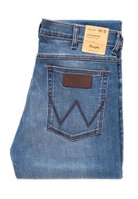 Wrangler - WRANGLER GREENSBORO MĘSKIE SPODNIE JEANSOWE JEANSY DŻINSY BRIGHT STROKE W15QMU91Q