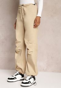 Renee - Beżowe Szerokie Spodnie ze Stoperami i Marszczoną Talią Nirli. Stan: podwyższony. Kolor: beżowy #5