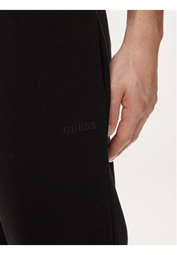 Guess Szorty materiałowe Clovis M4GD10 KBK32 Czarny Loose Fit. Kolor: czarny. Materiał: bawełna, syntetyk