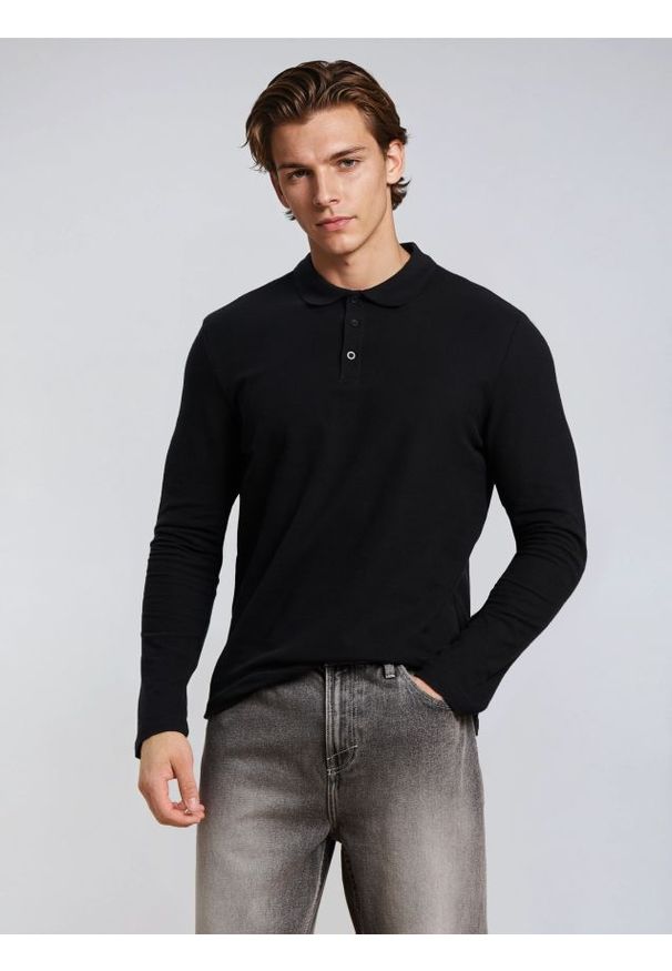 Sinsay - Bawełniana koszulka polo - czarny. Typ kołnierza: polo. Kolor: czarny. Materiał: bawełna