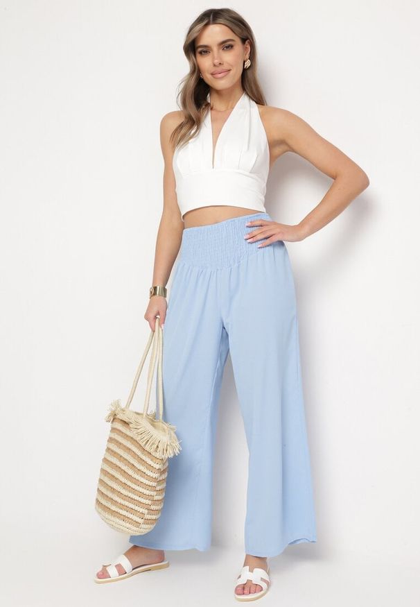 Born2be - Jasnoniebieskie Spodnie z Prostą Nogawką i Marszczoną Gumką w Pasie Perdila. Kolor: niebieski. Sezon: lato