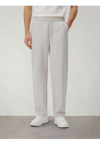 Reserved - Spodnie z wiązaniem - jasnoszary. Kolor: szary. Materiał: dzianina, bawełna