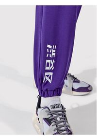 Togoshi Spodnie dresowe TG22-SPM012 Fioletowy Oversize. Kolor: fioletowy. Materiał: dresówka, wiskoza, syntetyk