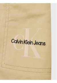 Calvin Klein Jeans Spódnica Monogram IG0IG01824 Beżowy Regular Fit. Kolor: beżowy. Materiał: bawełna