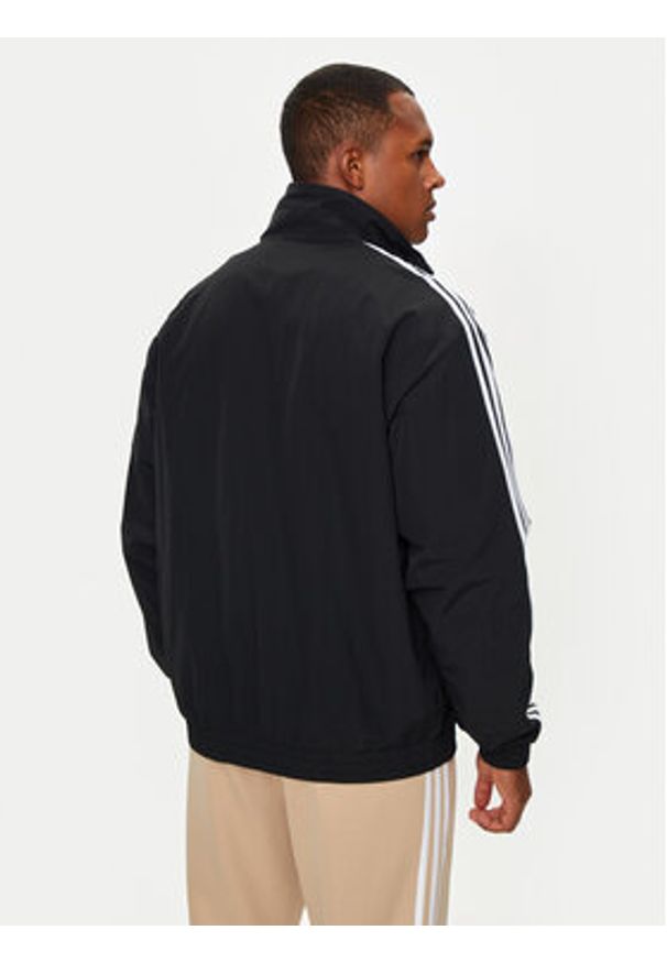 Adidas - adidas Bluza adicolor Firebird IT2491 Czarny Loose Fit. Kolor: czarny. Materiał: syntetyk