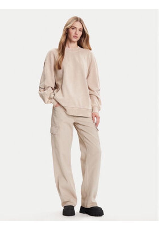 G-Star RAW - G-Star Raw Spodnie materiałowe Judee D24673-E078 Beżowy Relaxed Fit. Kolor: beżowy. Materiał: bawełna