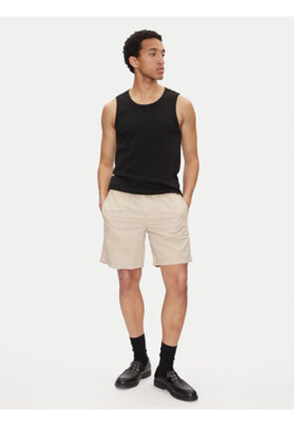 Calvin Klein Jeans Szorty materiałowe J30J327300 Beżowy Regular Fit. Kolor: beżowy. Materiał: bawełna