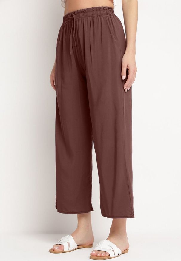 Born2be - Brązowe Bawełniane Spodnie z Szerokimi Nogawkami Palazzo z Gumką w Pasie Nesira. Okazja: na co dzień, na spacer. Kolor: brązowy. Materiał: bawełna. Styl: boho, casual