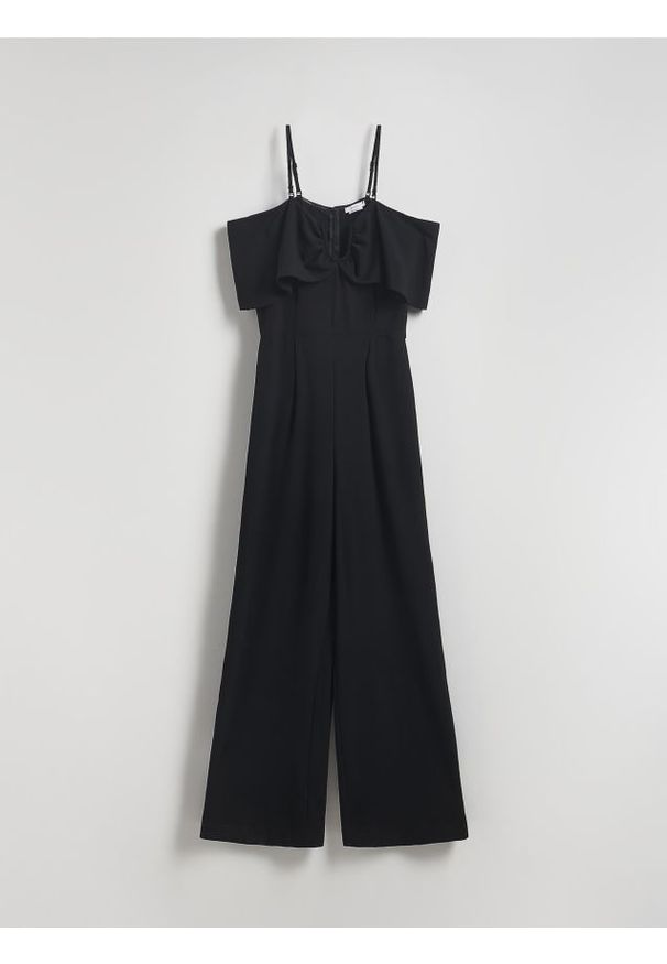 Reserved - Kombinezon z dekoracyjną falbaną - czarny. Kolor: czarny. Materiał: tkanina. Wzór: gładki. Typ sukienki: proste