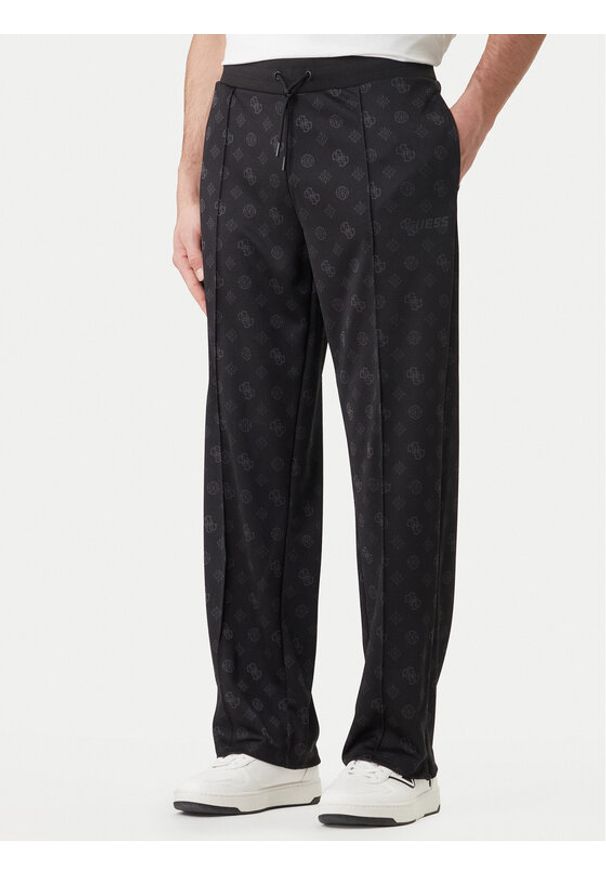 Guess Spodnie dresowe Z6GB03 K2850 Czarny Regular Fit. Kolor: czarny. Materiał: syntetyk