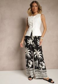 Renee - Czarne Szerokie Spodnie z Gumką w Pasie w Stylu Boho Evirami. Kolor: czarny. Sezon: lato. Styl: boho
