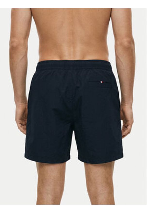 TOMMY HILFIGER - Tommy Hilfiger Szorty kąpielowe UM0UM03730 Granatowy Regular Fit. Kolor: niebieski. Materiał: syntetyk