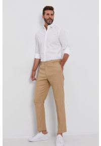 Calvin Klein Jeans Koszula J30J319065.4890 męska kolor biały slim z kołnierzykiem klasycznym. Typ kołnierza: kołnierzyk klasyczny. Kolor: biały. Materiał: tkanina. Długość rękawa: długi rękaw. Długość: długie. Wzór: gładki. Styl: klasyczny #7