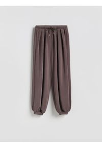 Reserved - Spodnie balloon - brązowy. Kolor: brązowy. Materiał: dzianina, wiskoza #1
