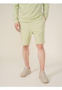 outhorn - Spodenki dresowe męskie - zielone. Kolor: zielony. Materiał: dresówka. Wzór: aplikacja #11