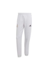 Adidas - Spodnie Real Madrid UBP Doubleknit. Kolor: biały, wielokolorowy, szary. Sport: piłka nożna