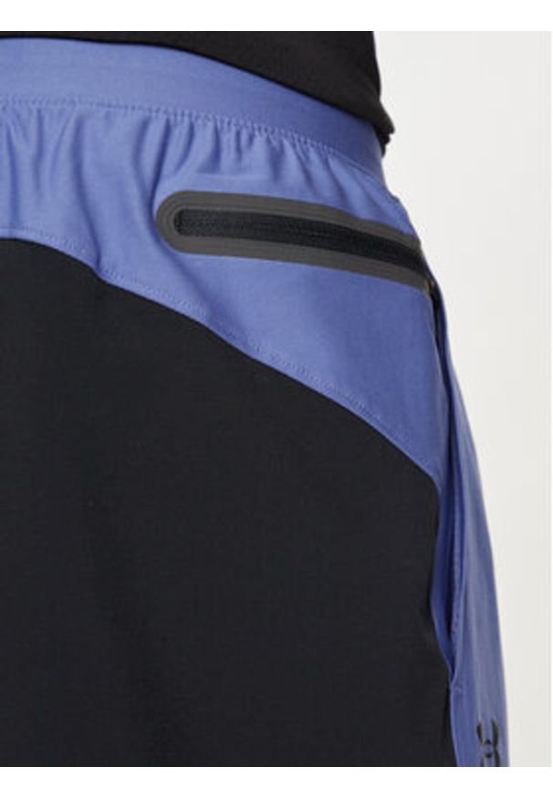 Under Armour Szorty sportowe Ua Peak Woven Hybrid Short 1383348-561 Niebieski Fitted Fit. Kolor: niebieski. Materiał: syntetyk. Styl: sportowy