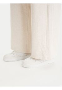 TOMMY HILFIGER - Tommy Hilfiger Spodnie dresowe UW0UW06180 Beżowy Wide Leg. Kolor: beżowy. Materiał: bawełna #5