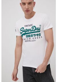 Superdry T-shirt bawełniany kolor biały z nadrukiem. Okazja: na co dzień. Kolor: biały. Materiał: bawełna. Wzór: nadruk. Styl: casual
