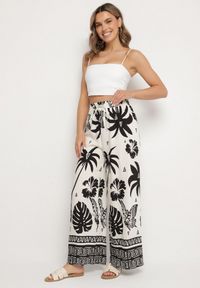 Born2be - Czarno-Beżowe Spodnie z Tropikalnym Wzorem i Szerokimi Nogawkami Emivelli. Okazja: na co dzień. Kolor: czarny. Styl: elegancki, casual #7
