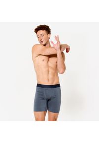 Decathlon - Bokserki męskie długie. Kolor: niebieski. Materiał: materiał, skóra, elastan. Długość: długie. Sport: fitness