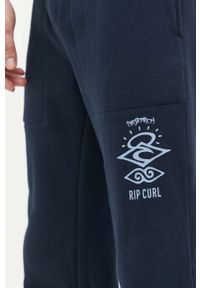 Rip Curl spodnie dresowe kolor granatowy z nadrukiem. Kolor: niebieski. Materiał: dresówka. Wzór: nadruk #4