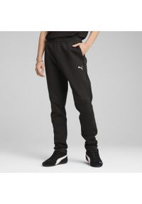 Puma - Męskie spodnie EVOSTRIPE PUMA Black. Kolor: czarny. Materiał: dresówka. Sport: piłka nożna