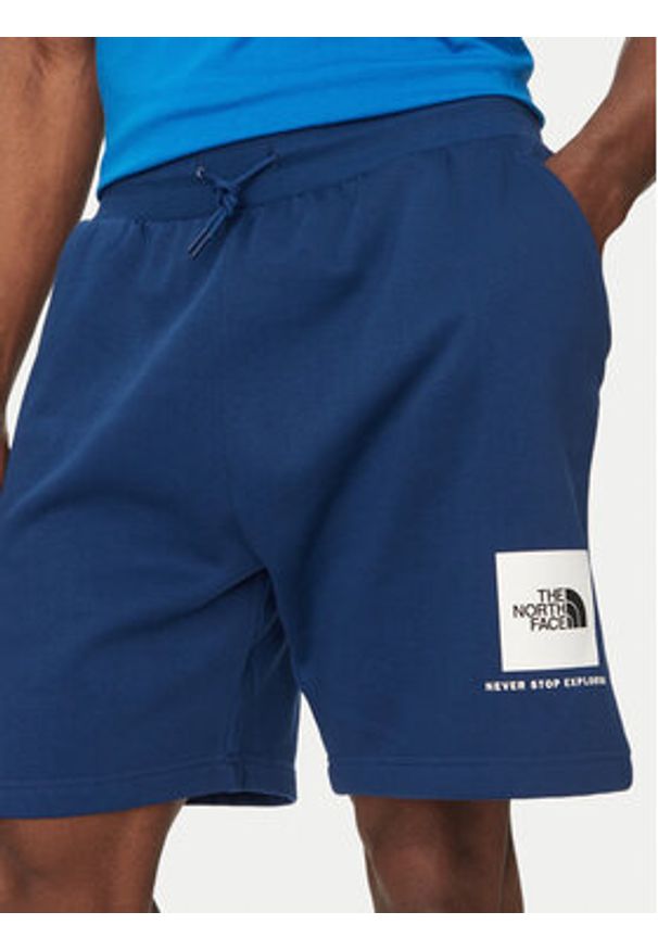The North Face Szorty sportowe Nse Box NF0A8C1J Niebieski Regular Fit. Kolor: niebieski. Materiał: bawełna. Styl: sportowy