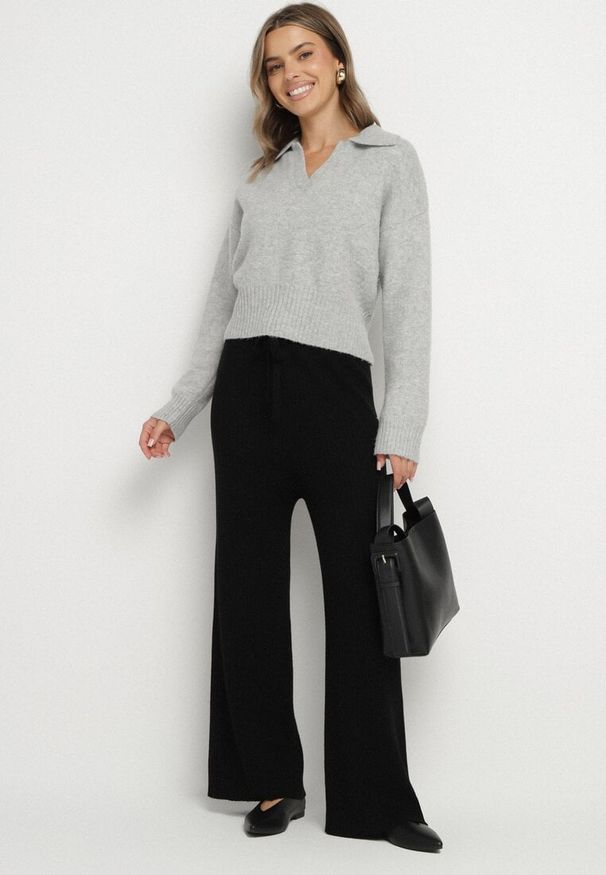 Born2be - Czarne Szerokie Spodnie High Waist z Wiskozą z Gumką w Pasie Essica. Okazja: na co dzień. Stan: podwyższony. Kolor: czarny. Materiał: wiskoza. Wzór: aplikacja. Styl: casual, elegancki