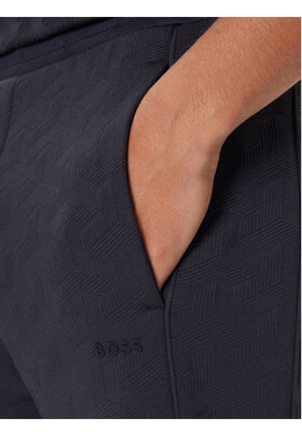 BOSS Spodnie dresowe Mirror Long 50549713 Granatowy Regular Fit. Kolor: niebieski. Materiał: syntetyk