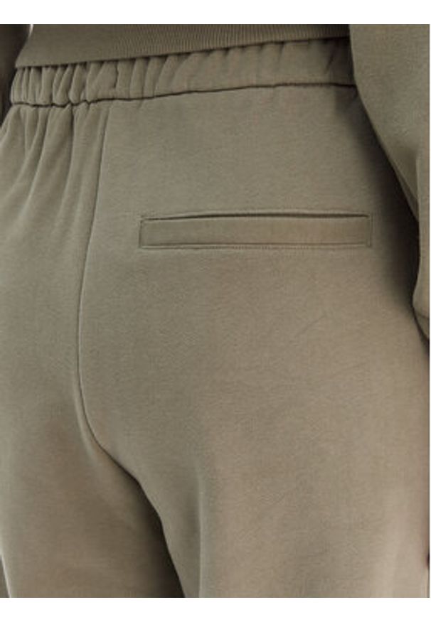 Adidas - adidas Spodnie dresowe JM1099 Zielony Regular Fit. Kolor: zielony. Materiał: bawełna