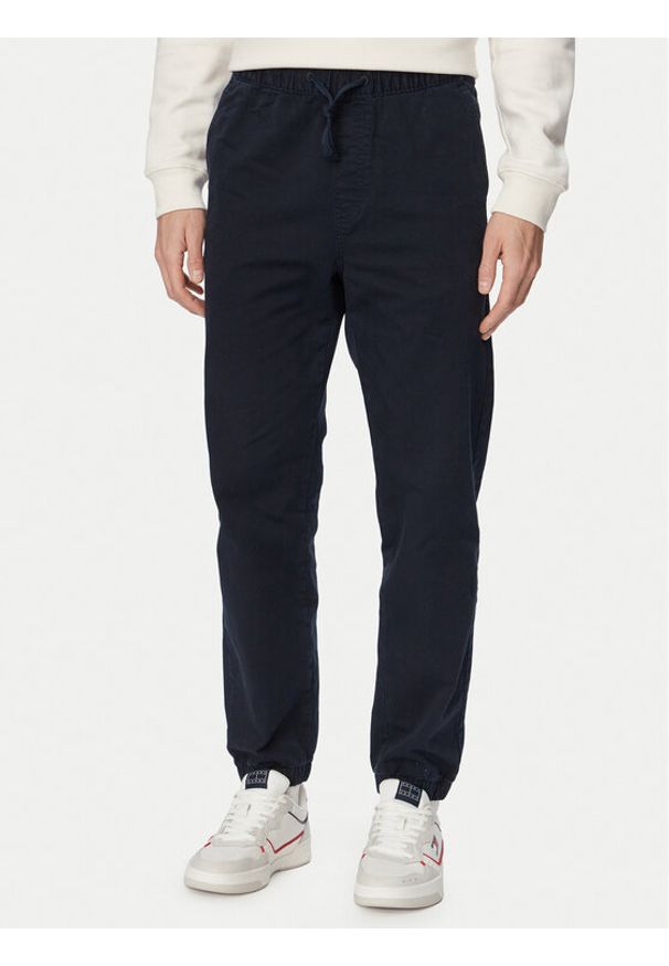 Tommy Jeans Joggery Sonny DM0DM22819 Granatowy Tapered Fit. Kolor: niebieski. Materiał: bawełna