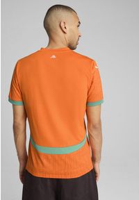 Puma - Koszulka domowa Côte d'Ivoire CAN 2025. Kolor: pomarańczowy, zielony, żółty, wielokolorowy