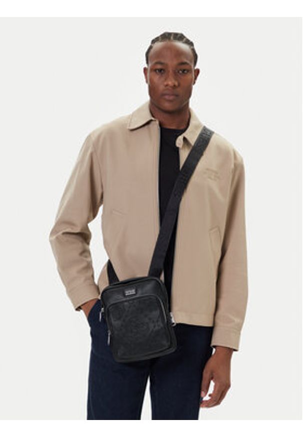 Guess Saszetka HMBOMG P5423 Czarny. Kolor: czarny. Materiał: skóra