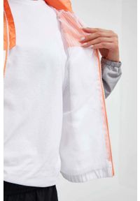 The North Face wiatrówka Mountain Athletics kolor pomarańczowy. Kolor: pomarańczowy. Materiał: materiał #4