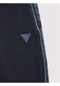 Guess Spodnie dresowe L2YQ48 K6ZS1 Granatowy Regular Fit. Kolor: niebieski. Materiał: bawełna #2