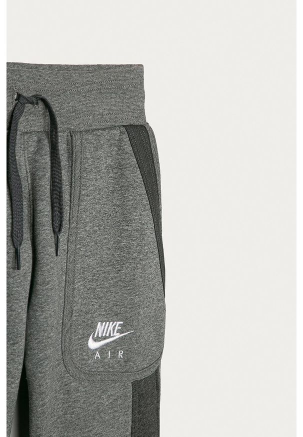 Nike Kids - Spodnie dziecięce 122-170 cm. Okazja: na co dzień. Kolor: szary. Styl: casual
