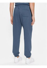 Reebok Spodnie dresowe Archive Essentials IM1526 Niebieski Regular Fit. Kolor: niebieski. Materiał: bawełna #2