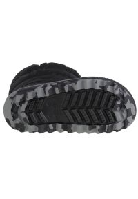 Buty Crocs Classic Neo Puff Boot Jr 207684-001 czarne. Wysokość cholewki: przed kolano. Kolor: czarny. Materiał: syntetyk, guma. Szerokość cholewki: normalna