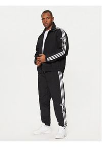 Adidas - adidas Spodnie dresowe Adibreak JD4257 Czarny Loose Fit. Kolor: czarny. Materiał: syntetyk