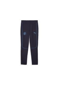 Puma - Męskie spodnie Casuals Manchester City PUMA New Navy Magic Blue. Kolor: niebieski. Sport: piłka nożna #1