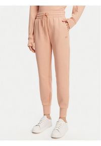 Lacoste Spodnie dresowe XF0343 Pomarańczowy Regular Fit. Kolor: pomarańczowy. Materiał: bawełna