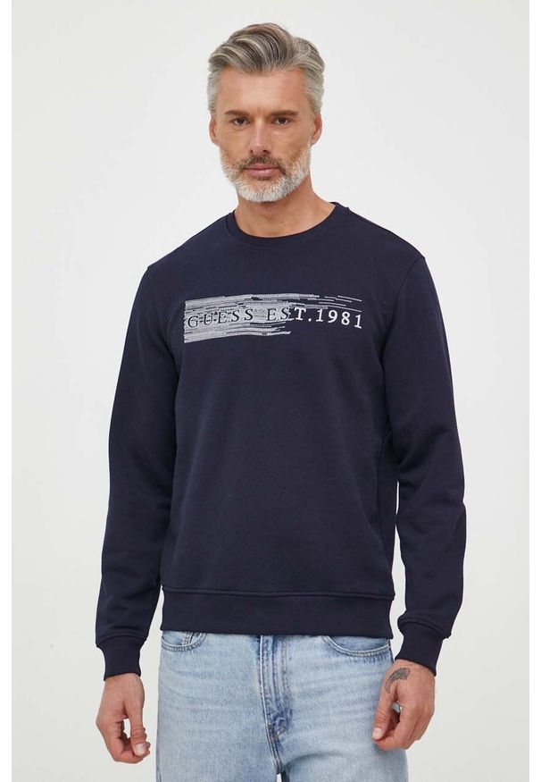 Guess bluza męska kolor granatowy z aplikacją. Kolor: niebieski. Wzór: aplikacja. Styl: klasyczny