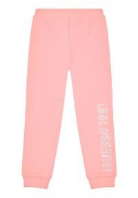 Spodnie dresowe Guess. Kolor: różowy. Materiał: dresówka #1