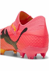 Buty piłkarskie męskie Puma Future 7 Ultimate Fg ag. Kolor: żółty, czarny, pomarańczowy, wielokolorowy. Materiał: syntetyk, tkanina, materiał. Sport: piłka nożna